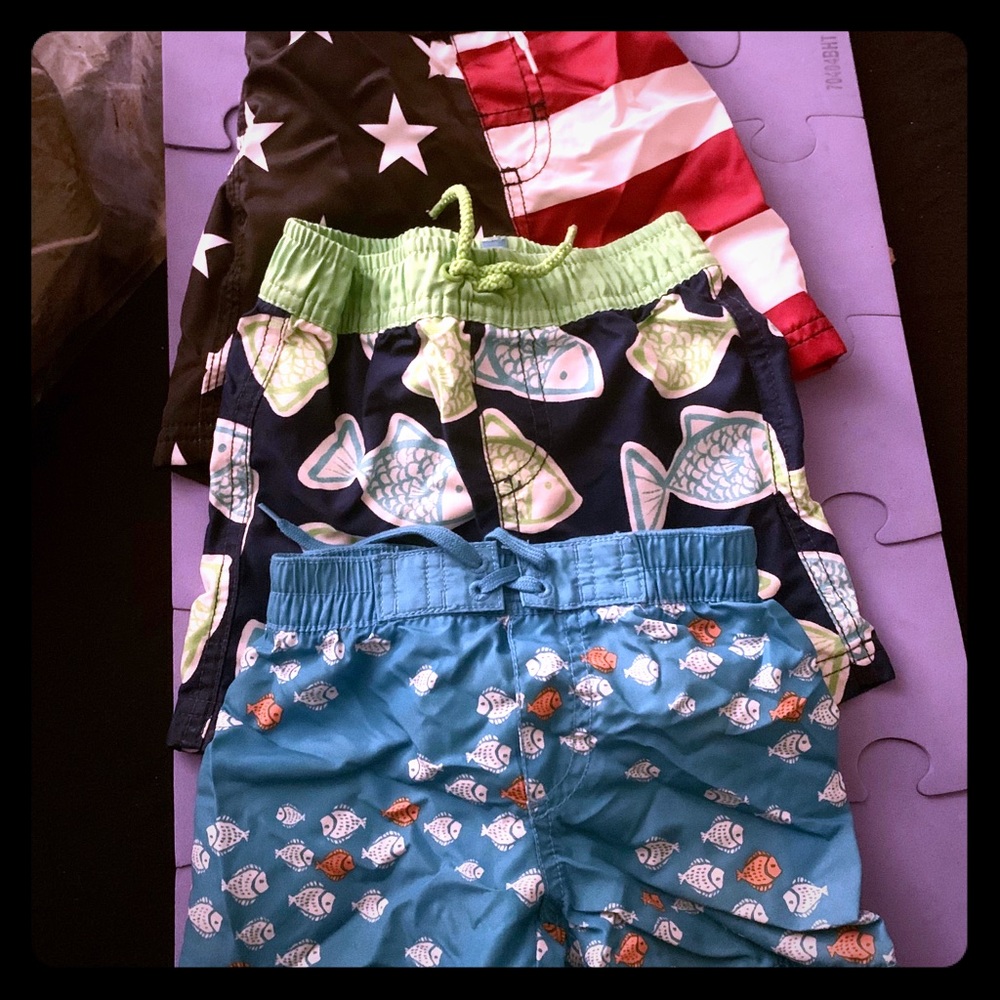 3 Boys swim shirts, flip flops & red sun glasses